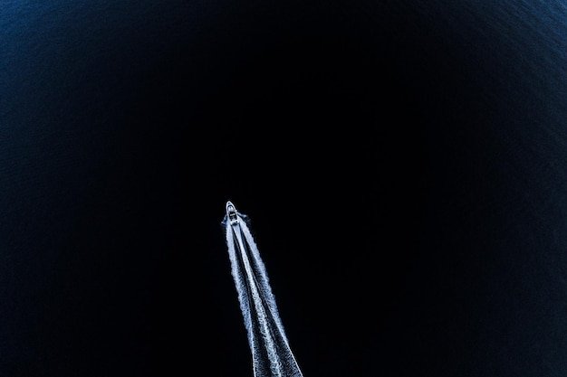 A sleek visualization of a Virgin Galactic spacecraft during a suborbital flight. The image should focus on the experience of passengers looking at the Earth from space.