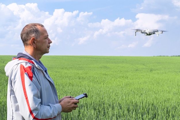 A farmer using a drone to monitor crop health and irrigation levels in a field, showcasing the application of precision agriculture in managing water resources.