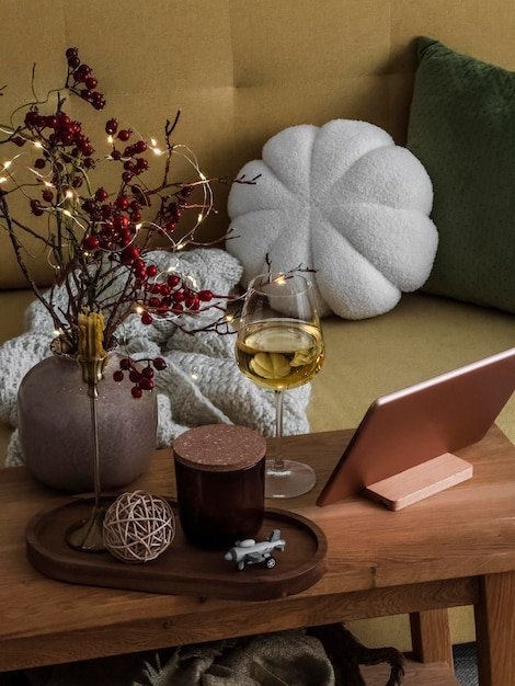 An interior shot of a cozy and well-decorated room listed on Airbnb, showcasing amenities such as a comfortable bed, workspace, and local artwork, appealing to cost-conscious travelers.