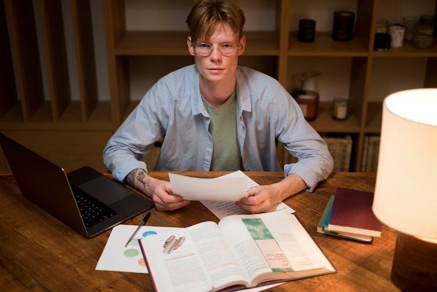 A person sitting at a desk reviewing financial documents and using a calculator, with a serene expression indicating they are actively planning and managing their retirement finances.