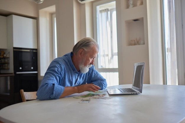 A person working on a laptop at home, exploring additional income opportunities to supplement their retirement savings.