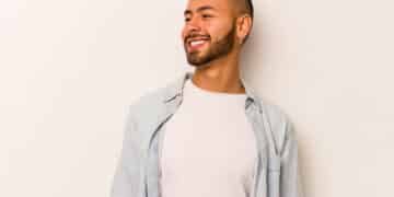 relaxed and happy laughing, neck stretched showing teeth.