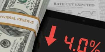 Visual representation of the Federal Reserve rate cut to 4.0% and its impact on personal finance.
